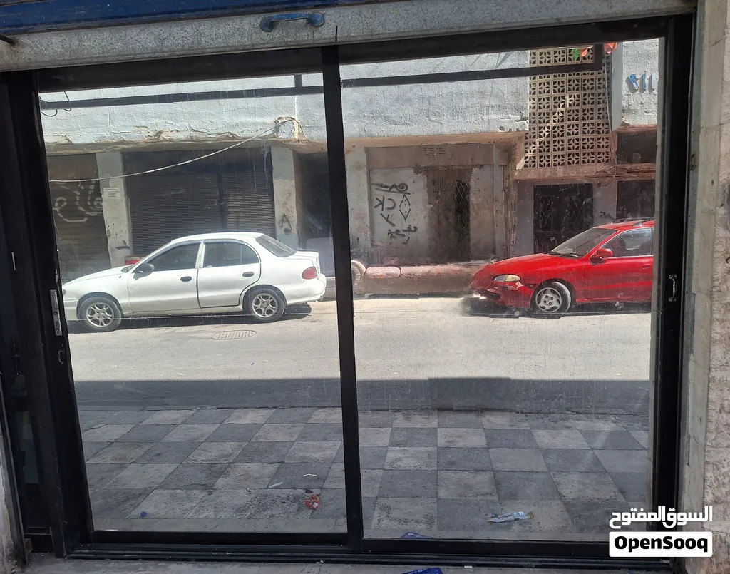 واجهه محل الامنيوم
