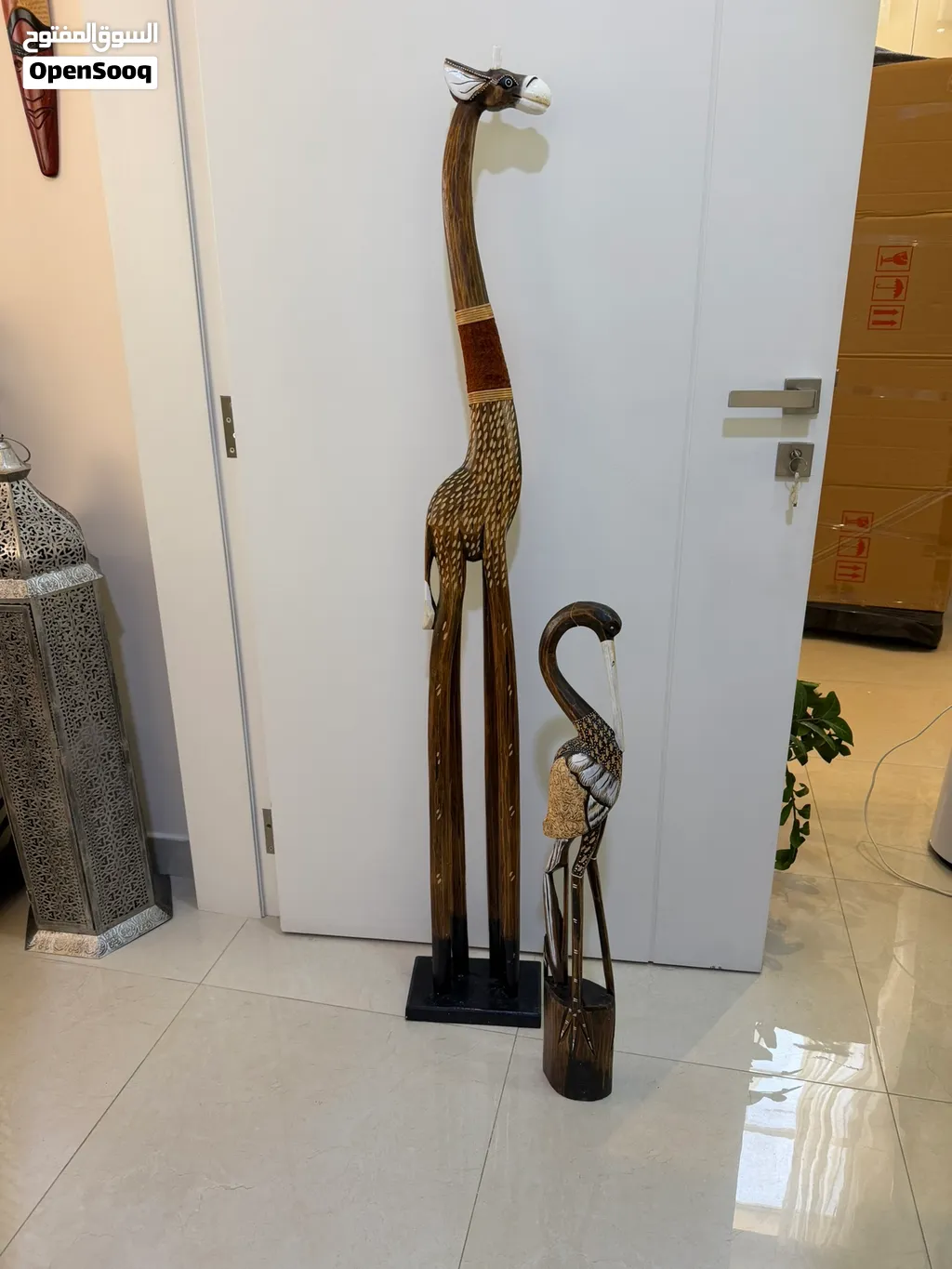 Wood Giraffe 2 meter hight and African Haron bird one meter hight