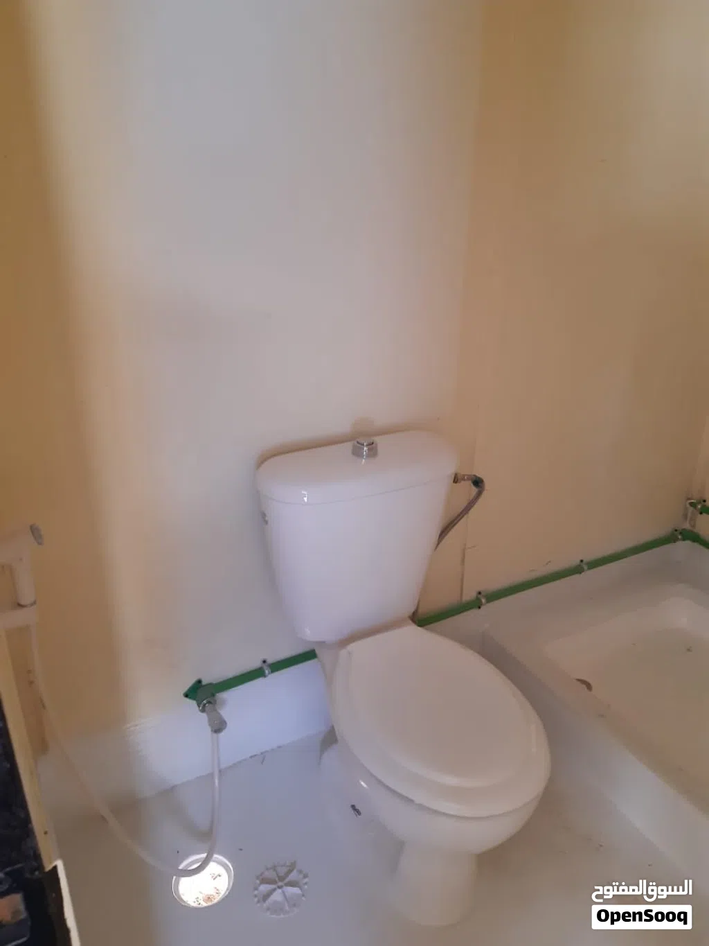 Refurbished plywood portacabin with two rooms and two toilets.