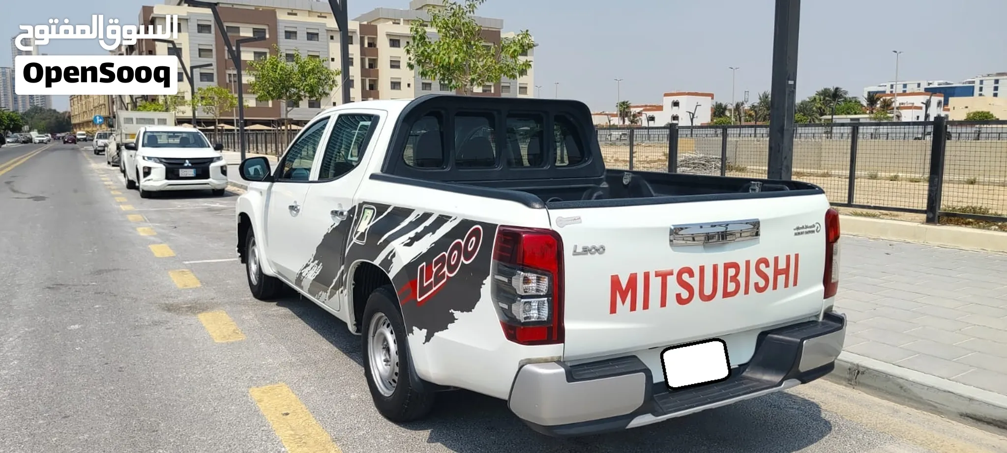ميتسوبيشي L200 GL غمارتين 2019  2.4 بنزين  قير عادي  دفع خلفي  ممشى 65,000 كم فقط  بدون حوادث.