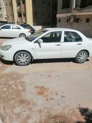 سياره لانسر بومه موديل 2014 سياره