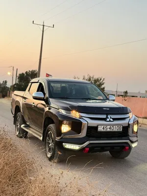 ميتسوبيشي L200 بيك اب 2022 ديزل مرخصة وإنارة نهارية وممورة