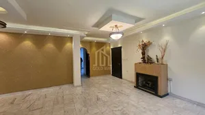 شقة أرضية مع حديقة 155م في أجمل مناطق دير غبار / ref 1079