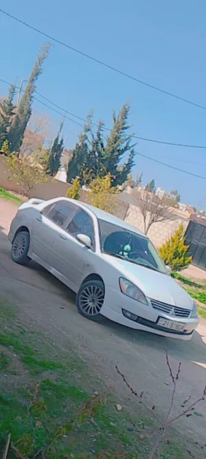 لانسر 2011لون ابيض خليجي