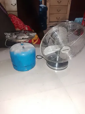 دافور وسط ومروحة صغيرة