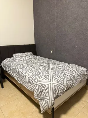 Single bed with mattress and headboard