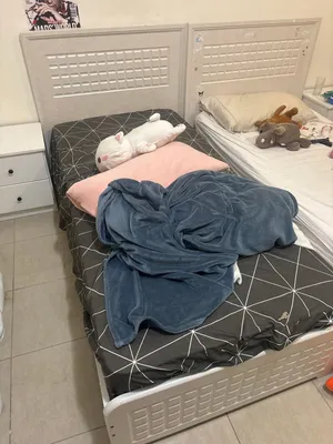white bed one person clean like new two beds