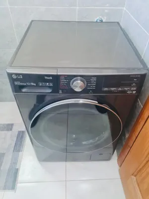 غسالة مع حماصه lG 12/8 kg