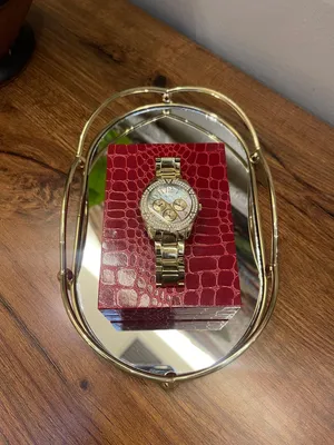 ساعه ماركه GUESS الحاله جيده جدا : جديد ألون ذهبي مرصعه كريستال