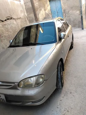 كيا تو نخب كوشوك نضيف امامي جديد خلفي نص عمر فحص خالي قص قلبان يوجد فتحه سقف متور قير نضيف مكيف شغال