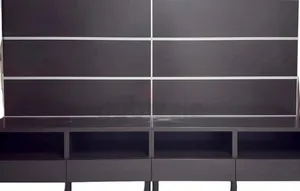 Modern dark wood TV entertainment unit with shelving and storage