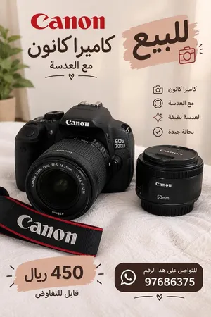 كاميرا كانون مع العدسة