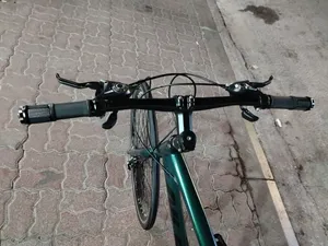 hybrid bike price 50 rial frame size 19.5 wheel size 700.35c location Muscat in azaiba