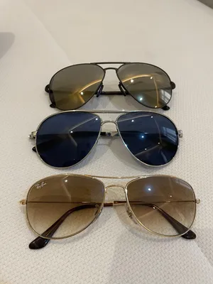 3 used sets of original brand sunglasses