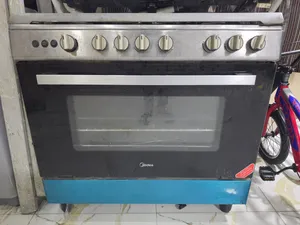 5 burner stove midea.