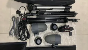 Studio lighting kit includes soft light boxes, stands, lamps, carrying case + one tripod camera