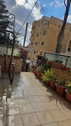 شقة مميزة طابق أرضي للبيع في تلاع العلي