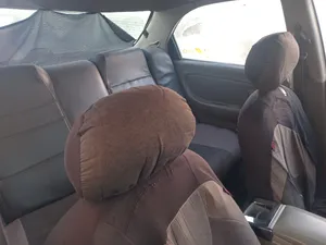كيا سيفيا 2000 برونزية صالون سيدان مع حساسات وكهربائي ومكيف