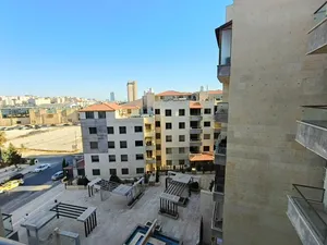 شقه مميزه للبيع شارع المدينه المنوره قرب مطعم ورد REF 15343