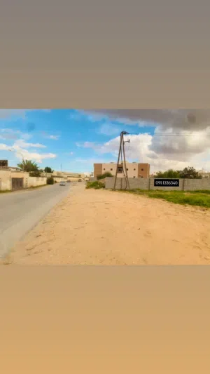 قطعة ارض تجاريه ممتازه على الطريق الرئيسي السنتر قصر بن غشير