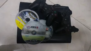 PS3 WITH CONTROLLERS AND GAMES