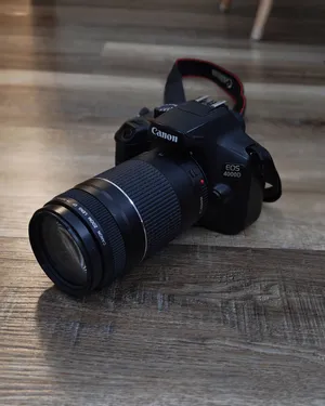 Canon D4000 Perfect Condition With Canon EF 70-300mm Lens In Black, Used For Only 1.5 Years.
