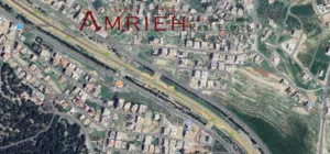 ارض 940 م للبيع في شارع المطار / على شارع الخدمات الرئيسي ( شارع المطار )