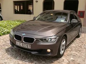 BMW 320i Brown on Beige Full Option Smooth Highway Mileage (Dubai–Abu Dhabi daily)
