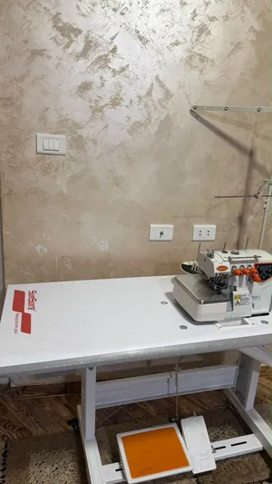 ماكينة أوفرلوك (حبكه) صناعية SunSure مع طاولة للبيع