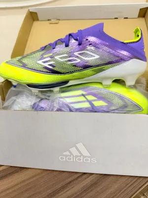 جوتي رياضي معشب اديداس f50