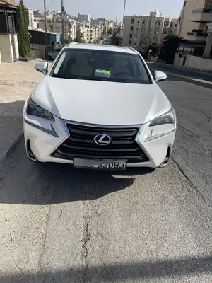 لكزس NX 300 2015 مستعملة بحالة ممتازة، مواصفات أمريكية، لون أبيض، دفع هجين خفيف