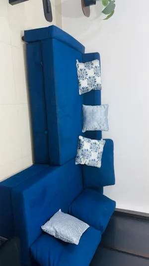 (sofa and bed and also have storage space from Ikea)(A small hairstyle from IKEA50 AE)(table 50 AED)