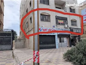 شقة مميزة للبيع طابق أول 3 غرف حديقة وكراج 40,000 دينار