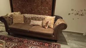 كنبات مع كراسي معيشة