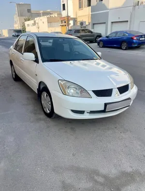 Mitsubishi Lancer 2009 for sale Car is good condition AC 100% OK Gear 100 % ok Engine 100% ok