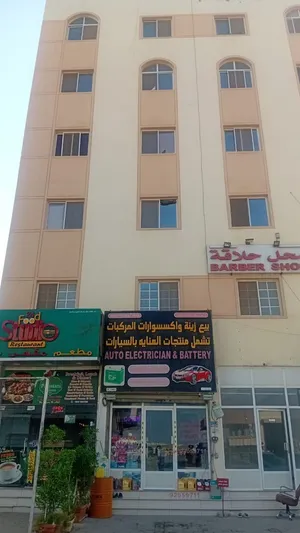 بناية سكنية تجارية مميزة للبيع في الخوض – موقع حيوي واستثماري ممتاز
