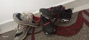 بوط بناتي نايك اروبي اصلي لون اسود وزهري نمره 38 ونص بوط بناتي نيوبلنس 36 بحالة جيده جدا الاثنين 10