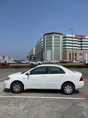 تويوتا كورولا 2006 XLI ابيض داخل بيج بهوان