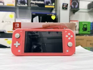 سويتش لايت لون وردي/كورال (كامل مع الكرتون والشاحن الأصلي) Switch Lite Coral (with Box & Charger)