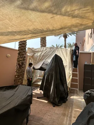 جاراج و مظلة للسيارة