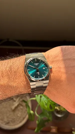 Tissot prx bought new and never worn ، ساعة تيسوت بي ار اكس ، جديدة لم تلبس ابد