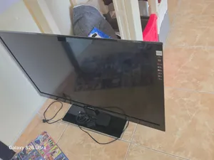 شاشة تلفيزيون مع المكتب
