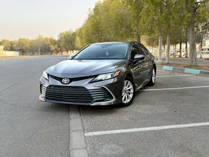 تويوتا:كامري LE مديل 2023 وأرد أمريكي يرباكات ممشى 70km يرباكات وكالة لون مميز بحالة وكالة