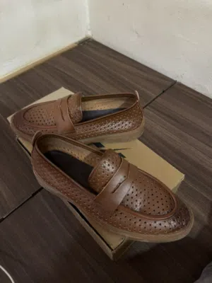 EGLE Textured Slip-On Formal Shoes