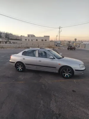 هونداي النترا 2003 اكس دي لون فضي بحاله ممتازه