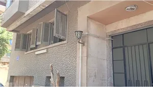 شقة للبيع ميدان الجيزة ( أرضي مرتفع )