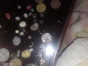 احجار عقيق وعملات قديمه وخرز للمحبين الجمع احجار كريمه وعملات قديمه