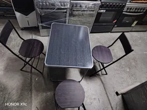 folding table and 3 chairs