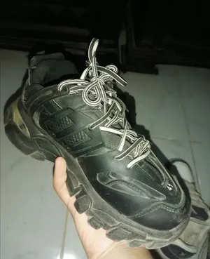 Balenciaga track and louis vuitton trainer
