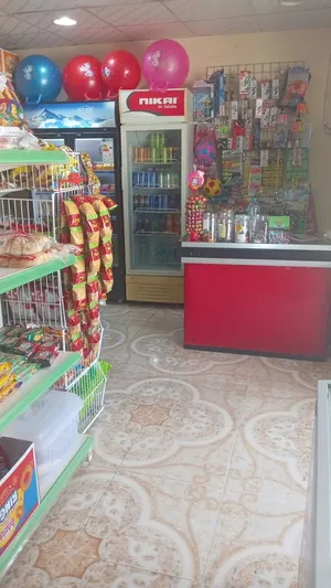 البيع بقاله بكامل أغراضها أجار المحل 40 ريال غير الكهرب باقي في العقد 10 شهور مطلوب 1500